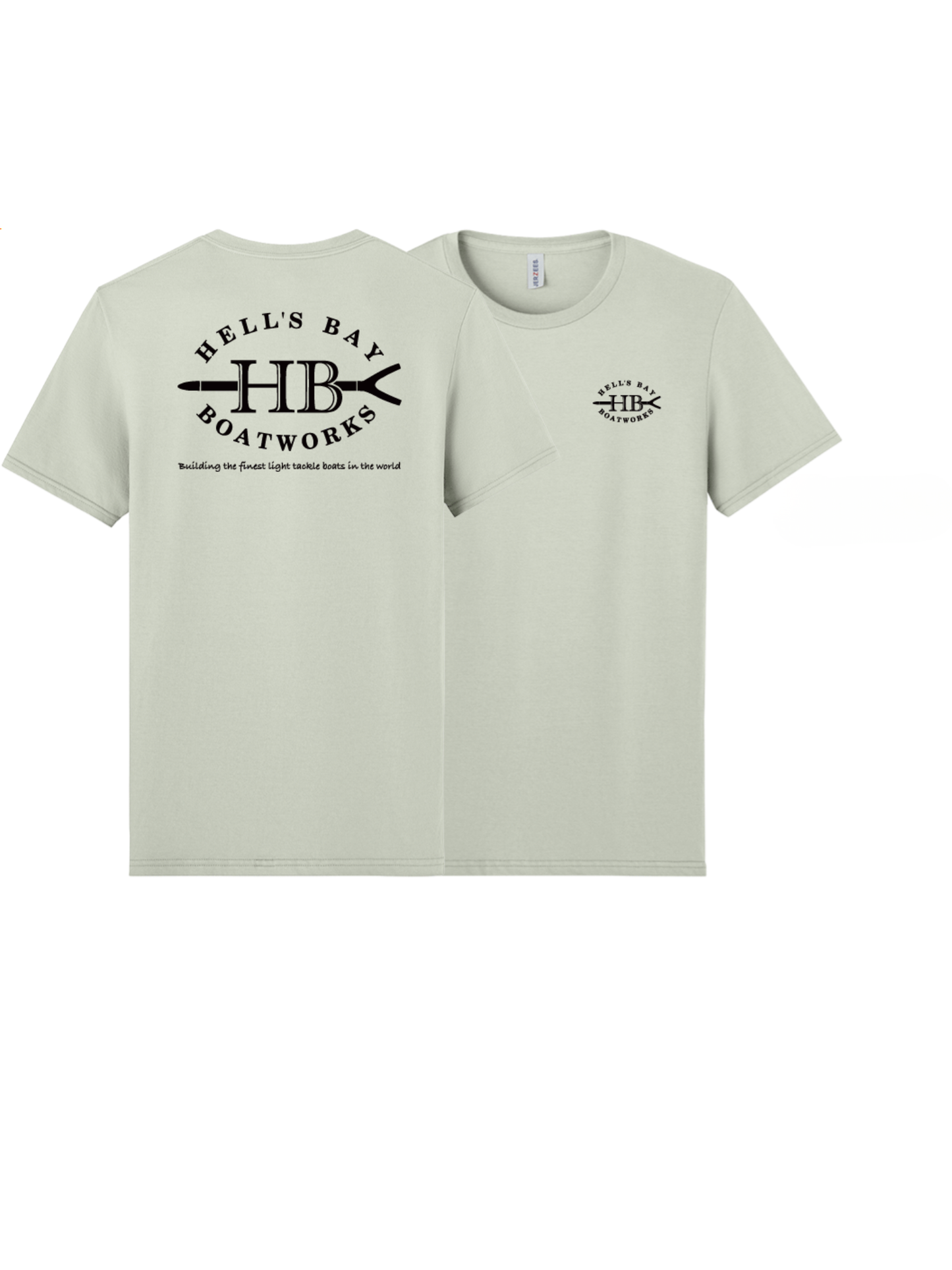 A light sage green t-shirt shown from both the front and back. The front features a small black circular logo on the left chest, and the back features a large black graphic reading 'HELL'S BAY BOATWORKS' with 'HB' in the center.